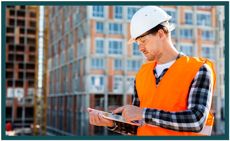 Men with tablet using Epicor ERP Building supply